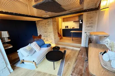 Coin salon dans l'établissement Charmant Duplex