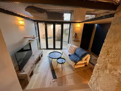 Coin salon dans l'établissement Charmant Duplex