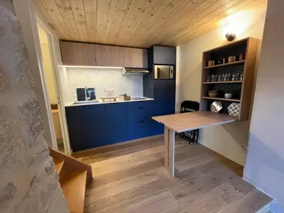 Cuisine ou kitchenette dans l'établissement Charmant Duplex