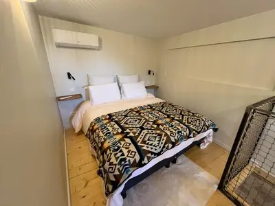 Un ou plusieurs lits dans un hébergement de l'établissement Charmant Duplex