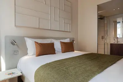 Un ou plusieurs lits dans un hébergement de l'établissement La Suite - Terreaux III - Studio with AC