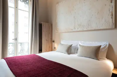 Un ou plusieurs lits dans un hébergement de l'établissement La Suite - Terreaux IV - 2 bedroom with AC
