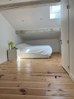 Un ou plusieurs lits dans un hébergement de l'établissement Appartement duplex centre historique