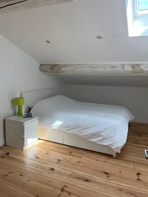 Un ou plusieurs lits dans un hébergement de l'établissement Appartement duplex centre historique