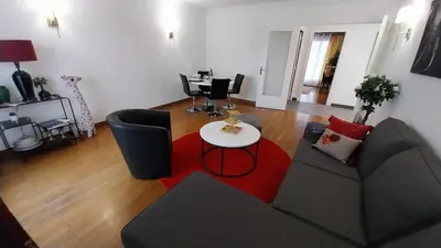 Coin salon dans l'établissement Appart 80m2 tout équipé Châteaucreux Zénith Stade