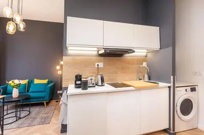Cuisine ou kitchenette dans l'établissement L'héritage & SPA