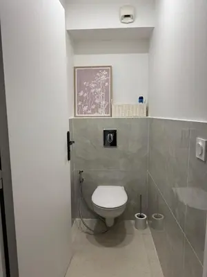 Salle de bains dans l'établissement joli appartement T4