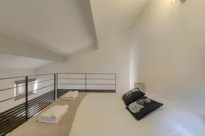 Un ou plusieurs lits dans un hébergement de l'établissement Le Mezza, Studio avec Mezzanine, Hypercentre