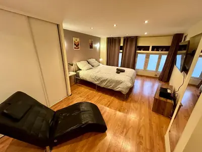 Un ou plusieurs lits dans un hébergement de l'établissement Appartement 2 chambres - proche Métro à 10min de Bellecour
