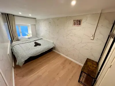 Un ou plusieurs lits dans un hébergement de l'établissement Appartement 2 chambres - proche Métro à 10min de Bellecour
