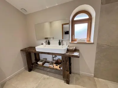Salle de bains dans l'établissement Le Domaine du Pin
