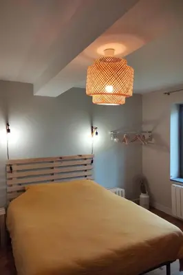 Un ou plusieurs lits dans un hébergement de l'établissement Gîte de Briante