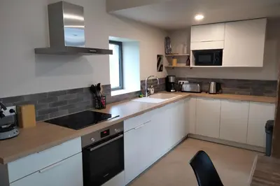 Cuisine ou kitchenette dans l'établissement Gîte de Briante