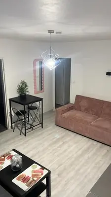 Coin salon dans l'établissement Appartement Bron proche eurexpo et hôpitaux
