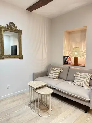 Coin salon dans l'établissement La Nichée appartement 2 chambres