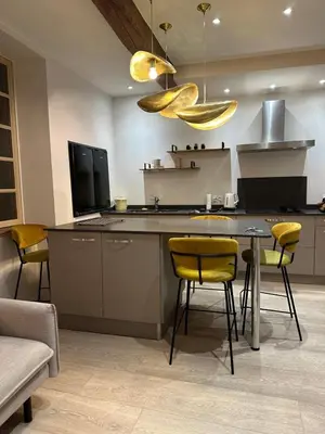 Cuisine ou kitchenette dans l'établissement La Nichée appartement 2 chambres