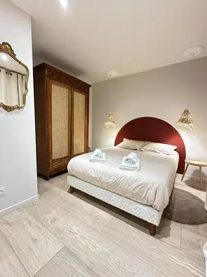 Un ou plusieurs lits dans un hébergement de l'établissement La Nichée appartement 2 chambres