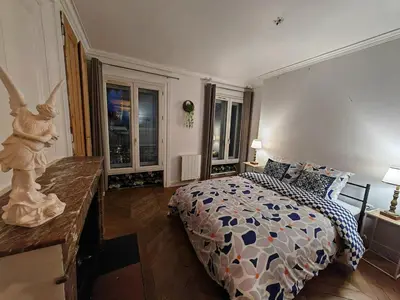 Un ou plusieurs lits dans un hébergement de l'établissement Grand loft bourgeois, Coeur Vieux Lyon