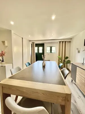 Coin salon dans l'établissement Beau T3 à 15 min de Lyon