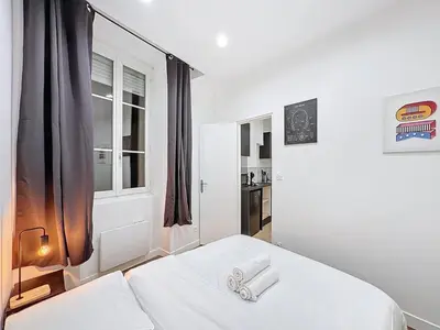 Un ou plusieurs lits dans un hébergement de l'établissement My Home Saint Jérome 2