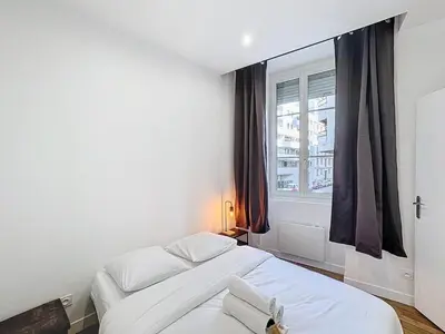 Un ou plusieurs lits dans un hébergement de l'établissement My Home Saint Jérome 2