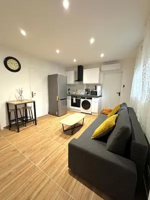 Cuisine ou kitchenette dans l'établissement Charmant T2 proche gare SNCF à 15 min de Lyon