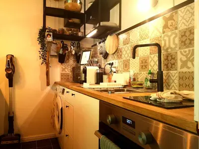 Cuisine ou kitchenette dans l'établissement Appartement cosy proche Centre des congrès et Transbordeur