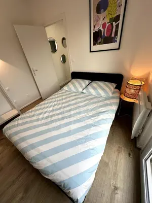 Un ou plusieurs lits dans un hébergement de l'établissement Appartement L'escale à Vienne
