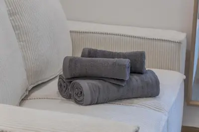 Un ou plusieurs lits dans un hébergement de l'établissement Pasteur Collection - Cosy & Charmant 2pers
