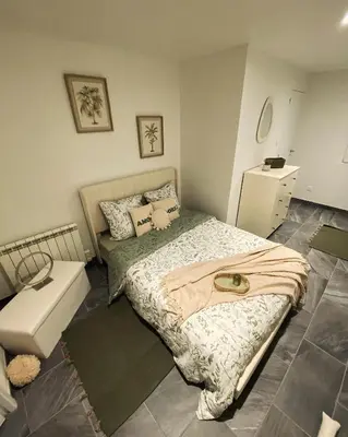 Un ou plusieurs lits dans un hébergement de l'établissement Cosy Home avec Spa - Proximité airport, CNPE, Eurexpo, Groupama Stadium, LYON