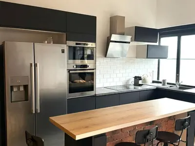 Cuisine ou kitchenette dans l'établissement Le Loft d 'Éveux - 2 places de parking