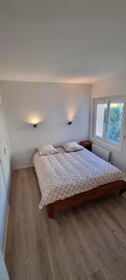 Un ou plusieurs lits dans un hébergement de l'établissement Villa au calme dans le beaujolais vert