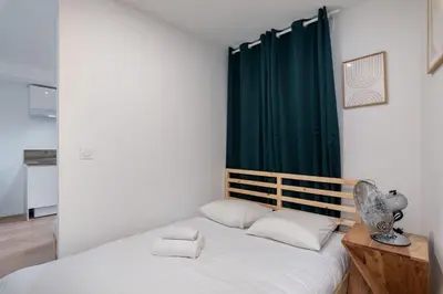 Un ou plusieurs lits dans un hébergement de l'établissement Apartment Perron - Cozy 2 people - Oullins