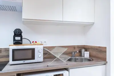 Cuisine ou kitchenette dans l'établissement Apartment Perron - Cozy 2 people - Oullins