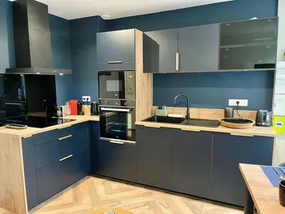 Cuisine ou kitchenette dans l'établissement l'Evasion avec Parking Privé & Clim