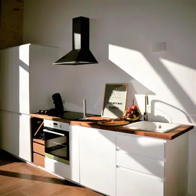 Cuisine ou kitchenette dans l'établissement Loft au cœur des vignes dans un ancien Chai