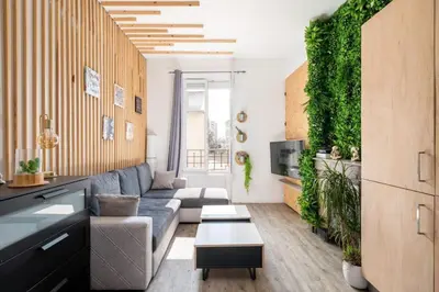 Coin salon dans l'établissement Le Charmant T2