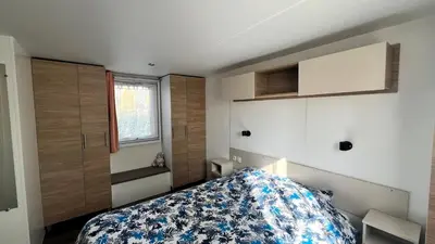 Un ou plusieurs lits dans un hébergement de l'établissement Détente et nature au bord du Rhône