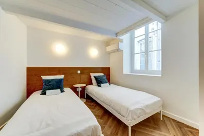 Un ou plusieurs lits dans un hébergement de l'établissement NOCNOC - Maison Louise