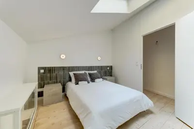 Un ou plusieurs lits dans un hébergement de l'établissement NOCNOC - Maison Louise