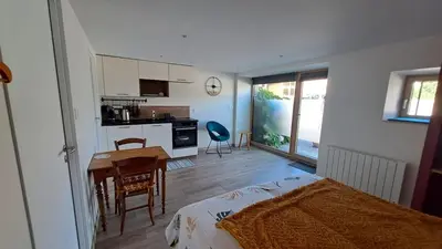 Cuisine ou kitchenette dans l'établissement Studio neuf 25m2 - 2 personnes