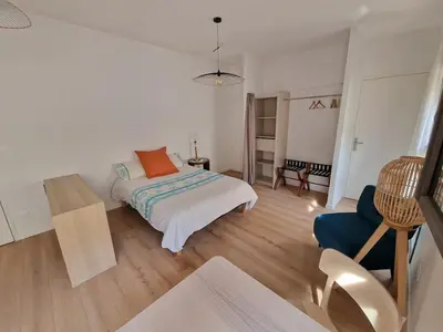 Un ou plusieurs lits dans un hébergement de l'établissement Studio neuf climatisé wifi 27m2