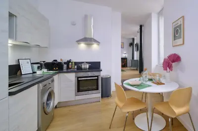 Cuisine ou kitchenette dans l'établissement Le Marty, T2 inoubliable, confort et style