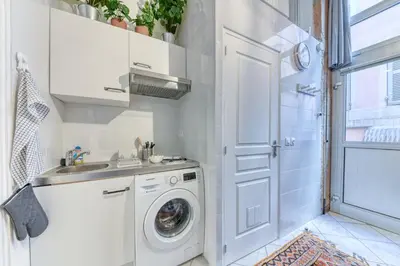 Cuisine ou kitchenette dans l'établissement GuestReady - Duplex Croix Rousse