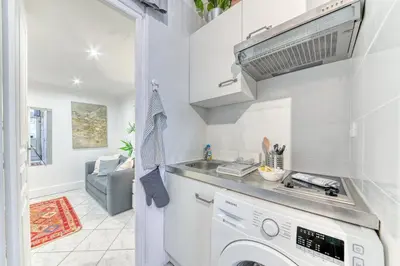 Cuisine ou kitchenette dans l'établissement GuestReady - Duplex Croix Rousse