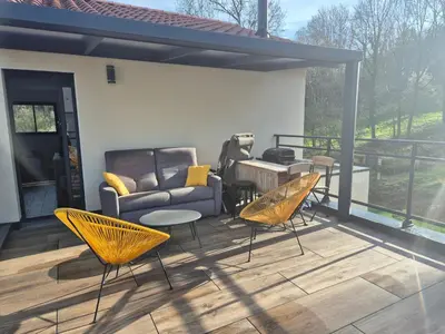 Coin salon dans l'établissement Appartement 1 chambre et terrasse