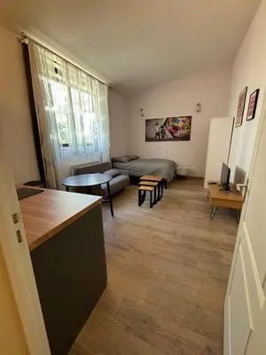 Un ou plusieurs lits dans un hébergement de l'établissement Suite Lyon Coeur Monplaisir