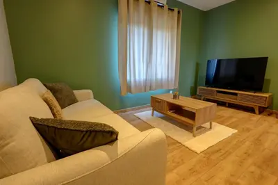 Télévision ou salle de divertissement dans l'établissement Havre de paix près de Pérouges, charme et confort