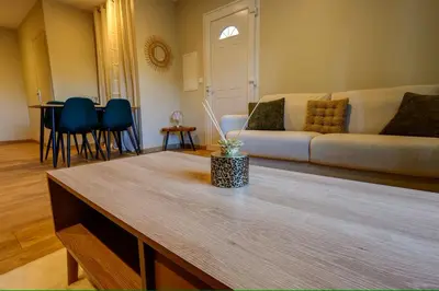 Coin salon dans l'établissement Havre de paix près de Pérouges, charme et confort