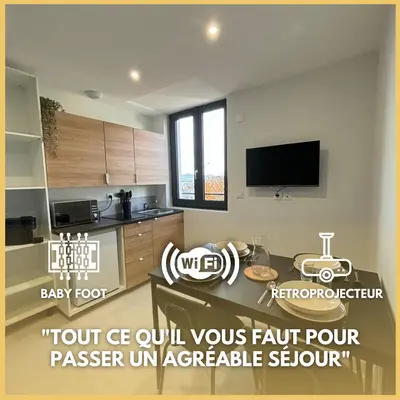 Télévision ou salle de divertissement dans l'établissement Le 19 Saint Priest en Jarez